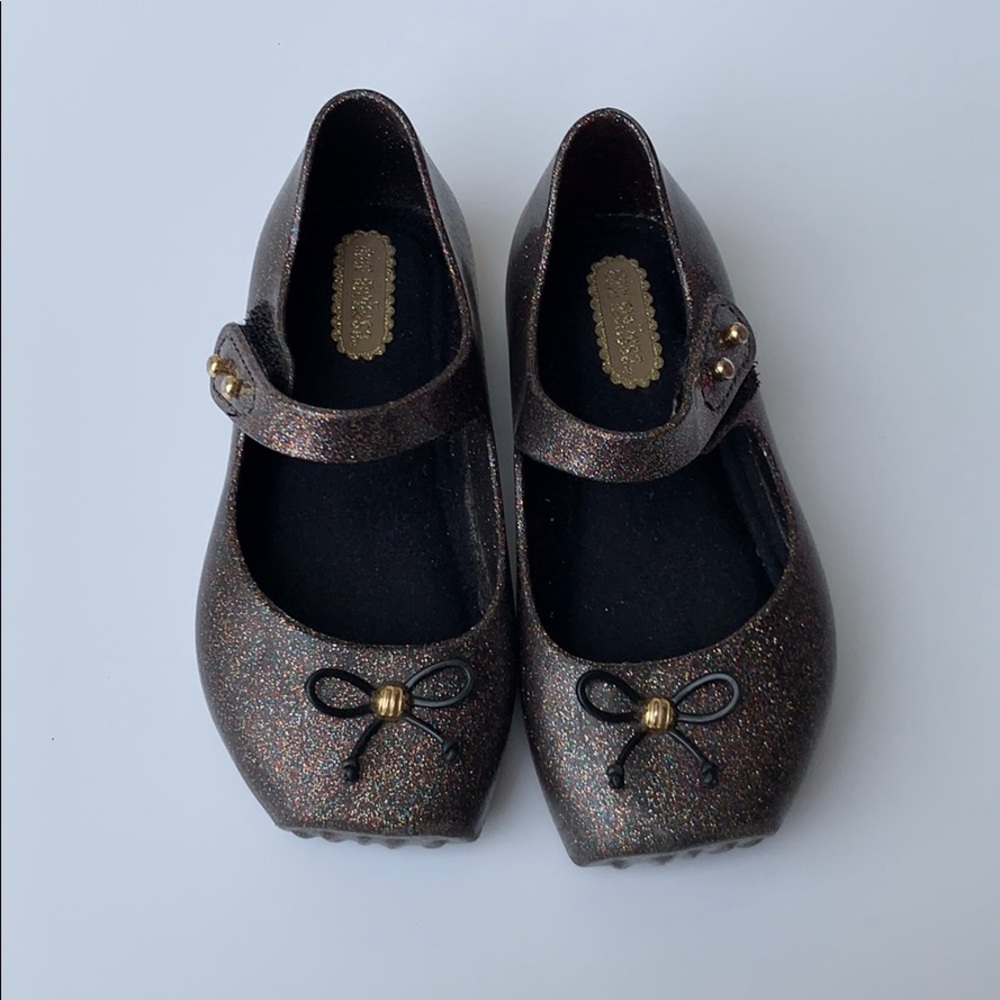 mini melissa black glitter size 7
